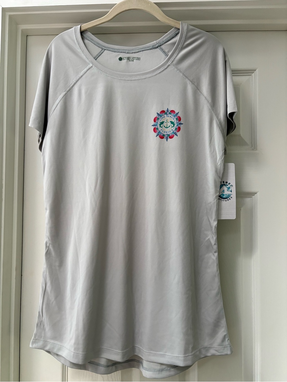 Light Gray Short Sleeve Tee with Floral Multicolor Chest Logo